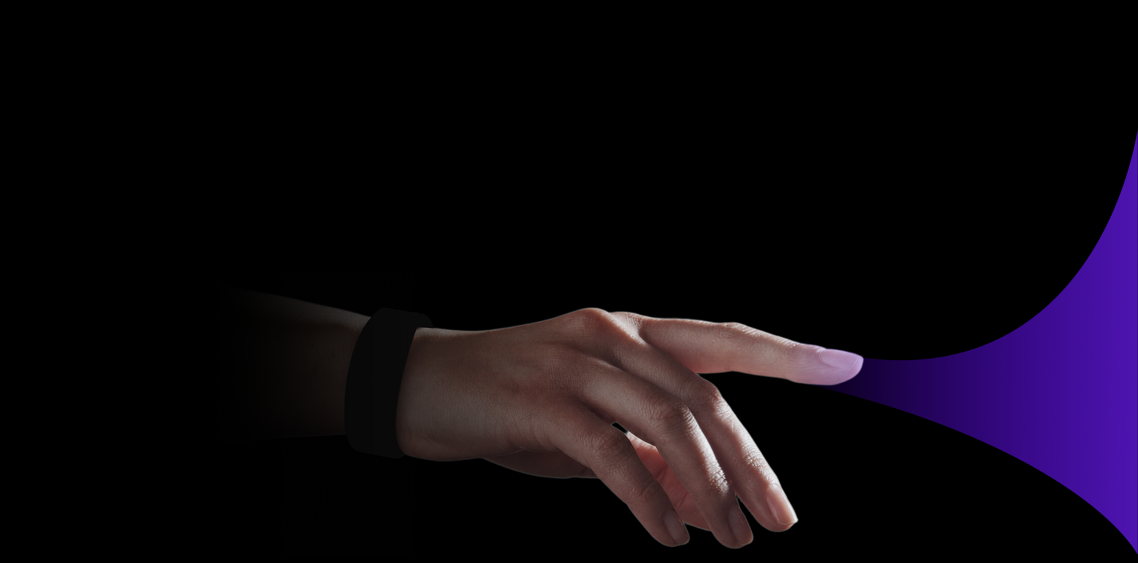 A hand reaching toward a purple interaction field